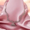Noorani Chand Pink AD Zirconia Necklace