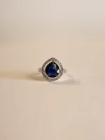 Neelanjana Royale – Blue Sapphire Crystal Halo Ring