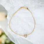 Golden Heart Whisper – Crystal Charm Minimal Bracelet