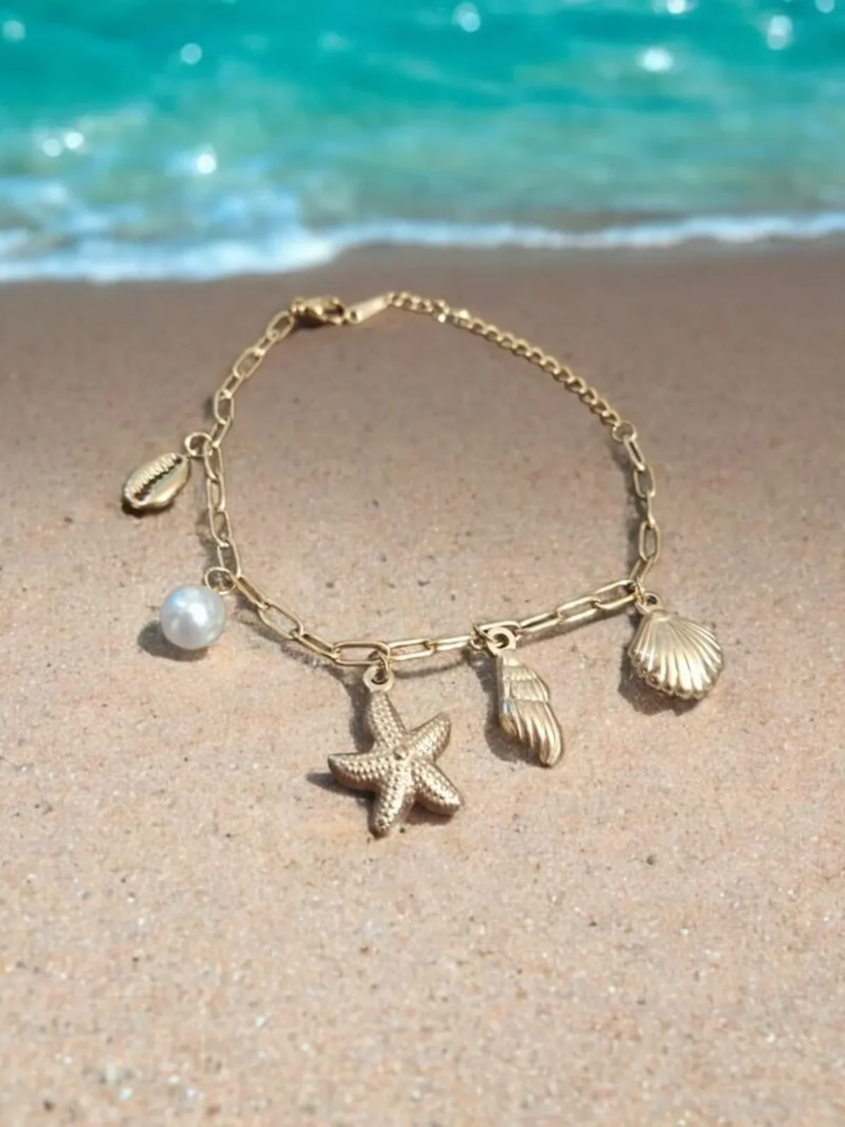 FF076_1765470439554_hqn15n3v592dz0x Ocean Whisper – Golden Starfish & Shell Charm Bracelet - Image 1