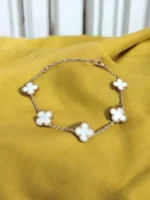 Golden Grace Clover – Elegant White Motif Charm Bracelet