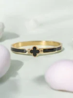 Noir Elegance – Black & Gold Clover Statement Bracelet