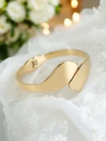 Golden Sculpted Wave Luxe – Anti-Tarnish Statement Bracelet
