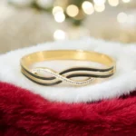 Twilight Wave Elegance – Golden Enamel Crystal Twist Bracelet